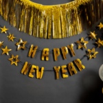 Obrázok z Party nápis Happy New Year - zlatý na čiernom povrázku 150 x 14 cm