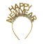 Zlatá čelenka s třpytivým nápisem HAPPY NEW YEAR – stylový doplněk pro silvestrovskou oslavu.