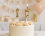 Zlatá dortová svíčka číslo 0 s korunkou v šampaňském odstínu