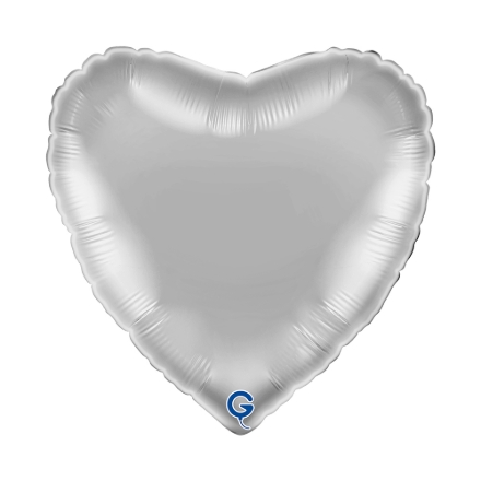 Stříbrný balonek ve tvaru srdce jako elegantní dekorace na oslavu nebo svatbu