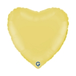 Matně žlutý balonek ve tvaru srdce jako svěží dekorace na dětskou nebo jarní oslavu