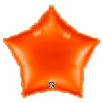 Oranžový balonek ve tvaru hvězdy jako výrazná dekorace na oslavu nebo Halloween